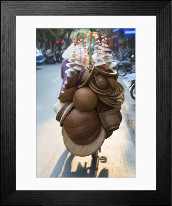 Framed Print : Woman selling goods on bicycle in Old Quarter, Hanoi, Vietnam Framed Print : Woman selling goods on bicycle in Old Quarter, Hanoi, Vietnam