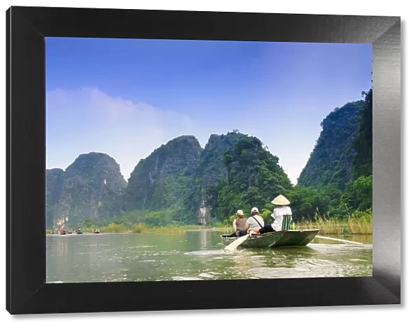 South East Asia, Vietnam, Ninh Binh, Tam Coc, river, rowing boat and limestone karsts