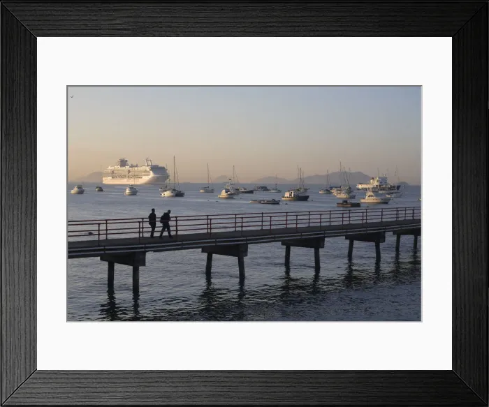 Framed Print : Panama, Panama City, People walking along jetty with a Cruise ship sailing in Framed Print : Panama, Panama City, People walking along jetty with a Cruise ship sailing in