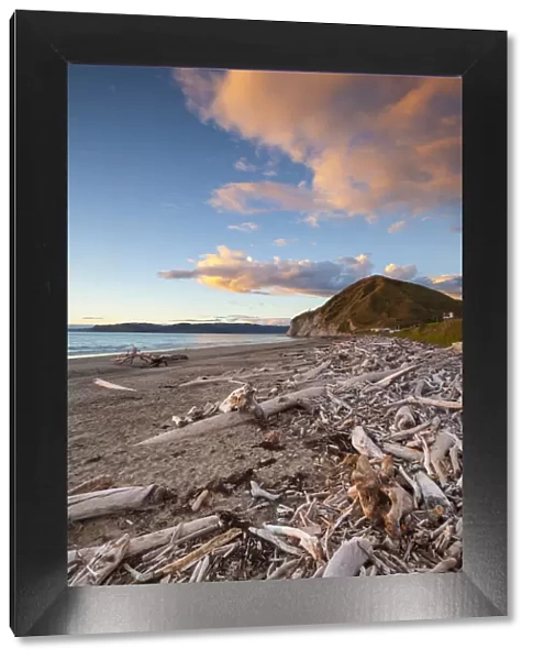 Picturesque beach illuminated at sunset, Mahia Peninsula, North Island, New Zealand