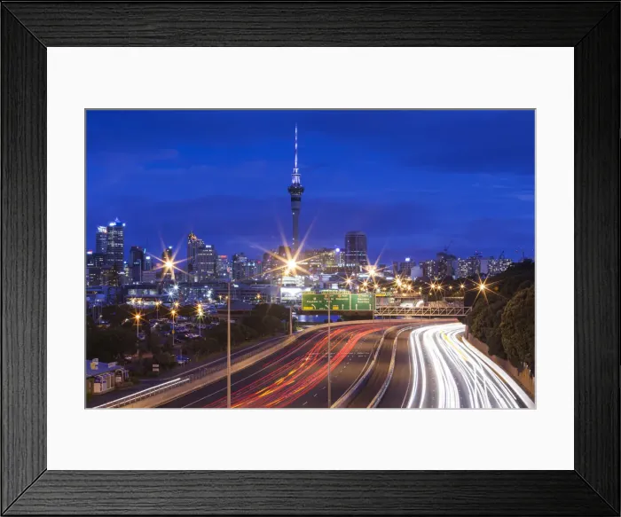 Framed Print : New Zealand, North Island, Auckland, skyline from Northern Motorway, dusk