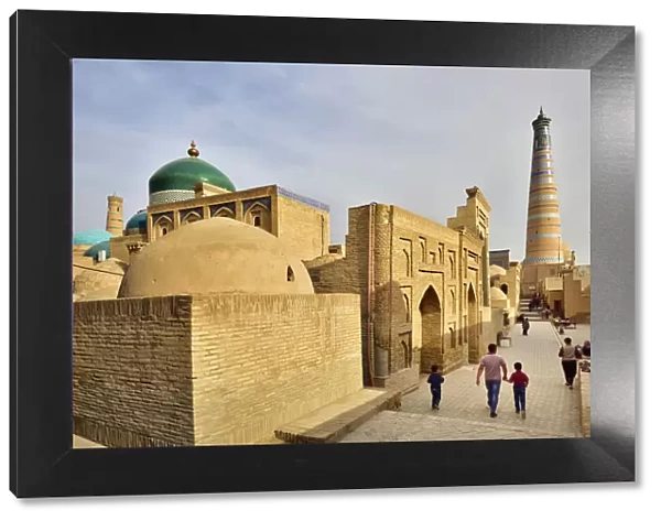 An ancient street and the Islam Khodja minaret and medressa