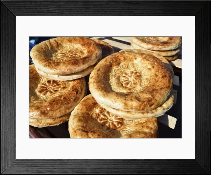Framed Print : Uzbek bread in the food market. Bukhara, a UNESCO World Heritage Site. Uzbekistan