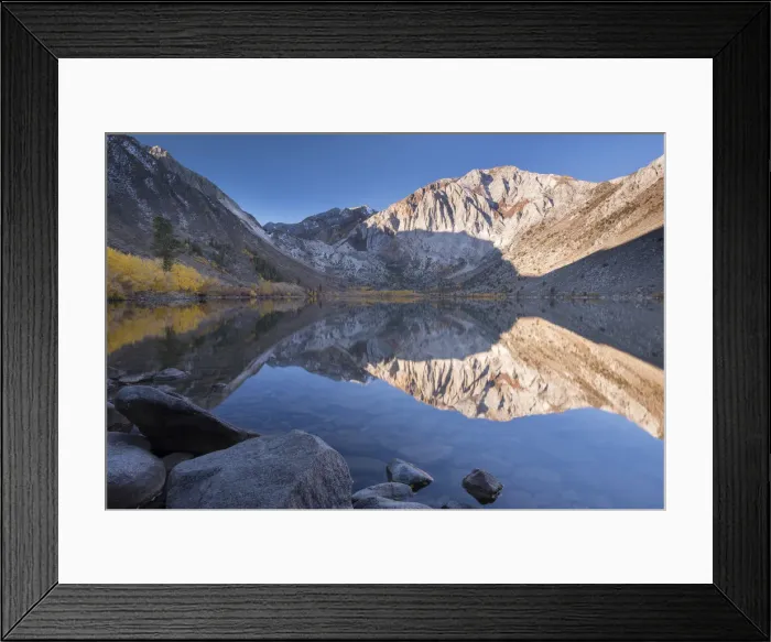 Framed Print : Early morning sunshine lights the Eastern Sierra Mountains beyond Convict Lake, California