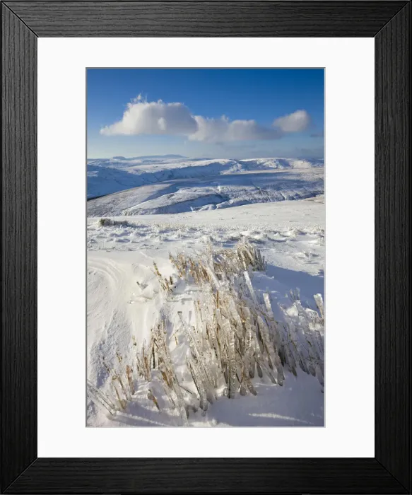 Framed Print : Frozen grass on the snow covered slopes of Pen y Fan mountain in the Brecon Beacons