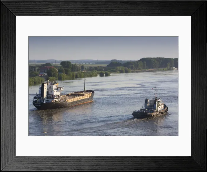 Framed Print : Romania, Danube River Delta, Tulcea, elevated view of freighter on the Danube River, dawn Framed Print : Romania, Danube River Delta, Tulcea, elevated view of freighter on the Danube River, dawn