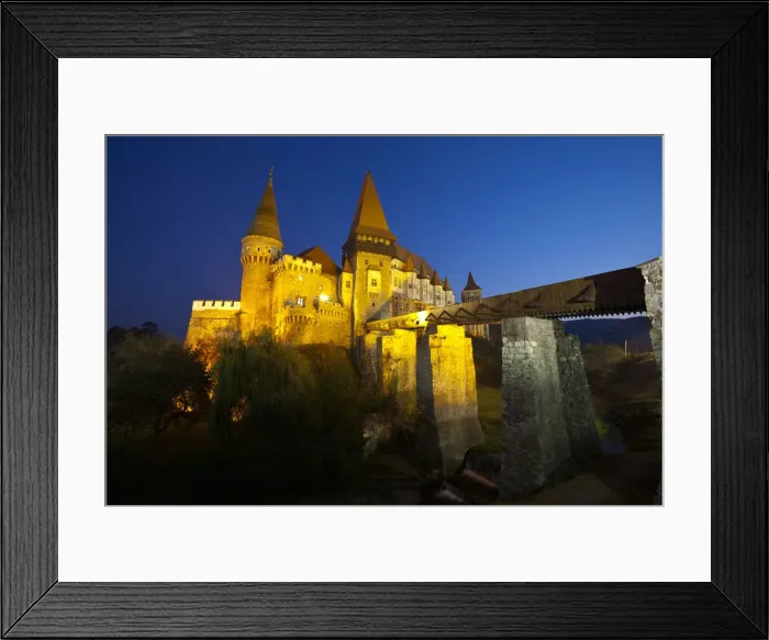 Framed Print : Hunyadi Castle or Corvins Castle illuminated at dusk, Hunedoara, Transylvania Framed Print : Hunyadi Castle or Corvins Castle illuminated at dusk, Hunedoara, Transylvania