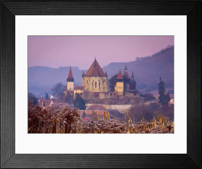 Framed Print : Elevated view towards Biertan fortified church at dusk, Biertan, nr Framed Print : Elevated view towards Biertan fortified church at dusk, Biertan, nr