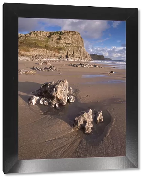 Dramatic cliffs and sandy beaches at Fall Bay on the Gower Peninsula, Wales, UK. Winter