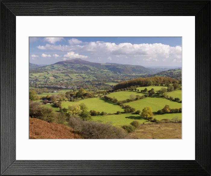 Framed Print : Rolling countryside views towards the Sugarloaf, Brecon Beacons, Powys, Wales. Autumn Framed Print : Rolling countryside views towards the Sugarloaf, Brecon Beacons, Powys, Wales. Autumn