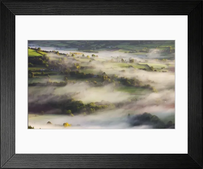 Framed Print : Mist blows over rolling countryside in the early morning near Talybont-on-Usk, Brecon Framed Print : Mist blows over rolling countryside in the early morning near Talybont-on-Usk, Brecon