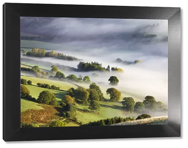 Mist covered rolling countryside in the Usk Valley, Brecon Beacons National Park, Powys