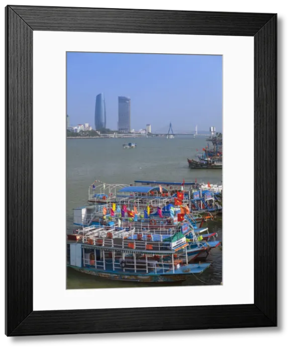Framed Print : Fishing boats on Song River and city skyline, Da Nang, Vietnam Framed Print : Fishing boats on Song River and city skyline, Da Nang, Vietnam