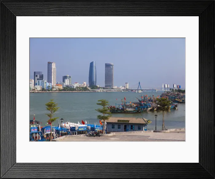 Framed Print : Fishing boats on Song River and city skyline, Da Nang, Vietnam Framed Print : Fishing boats on Song River and city skyline, Da Nang, Vietnam