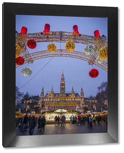 Austria, Vienna, Rathausplatz Christmas Market by Town Hall, evening