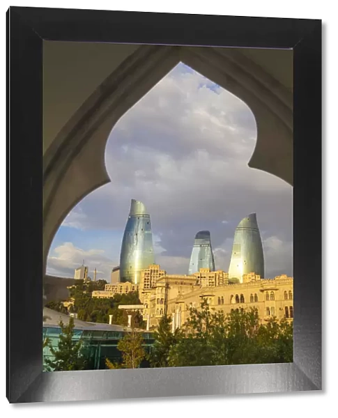 Azerbaijan, Baku, Flame Towers viewed through arches at Venezia Restaurant on The