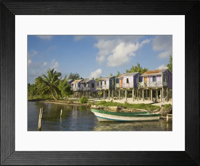 Framed Print : Belize, Caye Caulker, Wooden beach cabanas on stilts