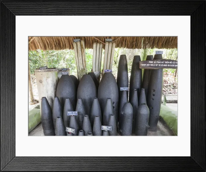 Framed Print : Vietnam, Ho Chi Minh City, Cu Chi Tunnels, Exhibit of Unexploded American Munitions Framed Print : Vietnam, Ho Chi Minh City, Cu Chi Tunnels, Exhibit of Unexploded American Munitions