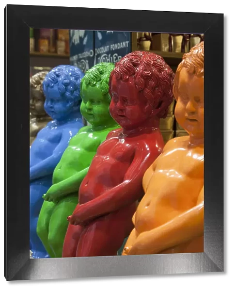 Belgium, Brussels, Chocolate Shop Window Display of Mannekin Pis Statues