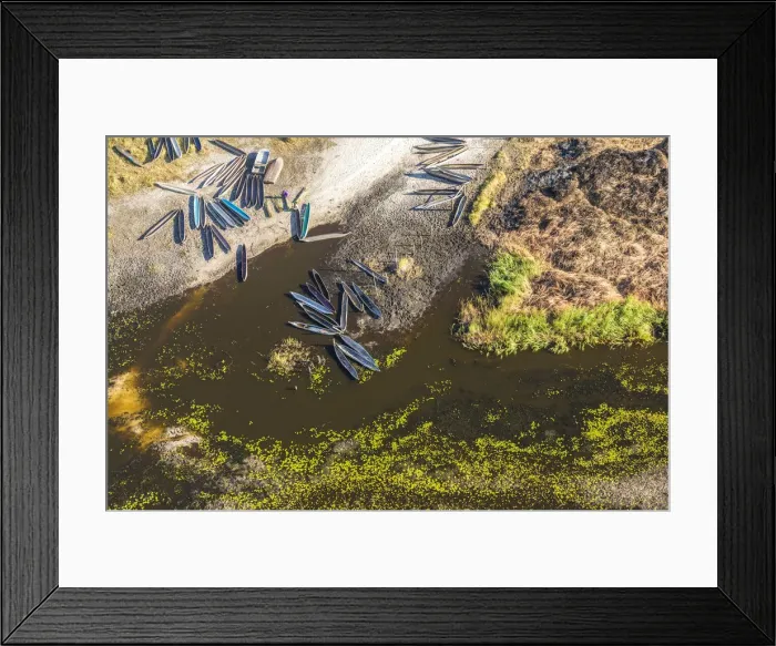 Framed Print : Aerial view of dugout canoes by river bank, Okavango Delta, Botswana, Africa