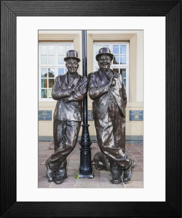 Framed Print : England, Cumbria, Lake District, Ulverston, Statue of Laurel and Hardy in front of Framed Print : England, Cumbria, Lake District, Ulverston, Statue of Laurel and Hardy in front of