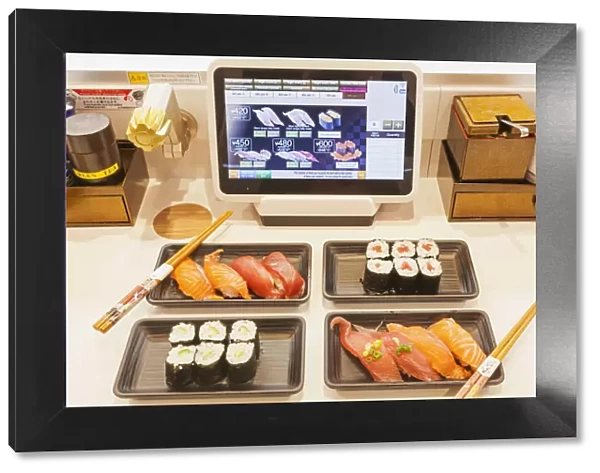 Japan, Honshu, Tokyo, Sushi Restaurant, Touch Screen Conveyor Belt Ordering System