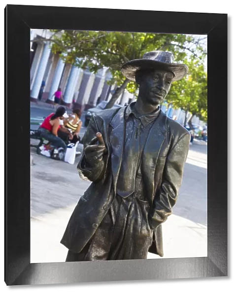 Cuba, Cienfuegos Province, Cienfuegos, Paseo del Prado, statue of world-famous local