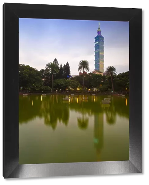Taiwan, Taipei, Taipei 101 reflecting in pond