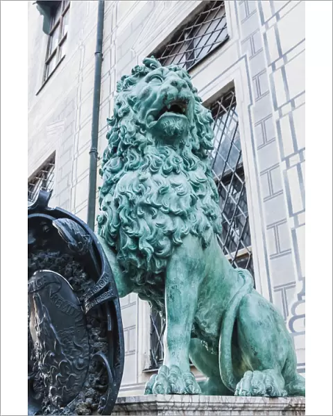 Germany, Bavaria, Munich, Lion Statue at The Residence Entrance