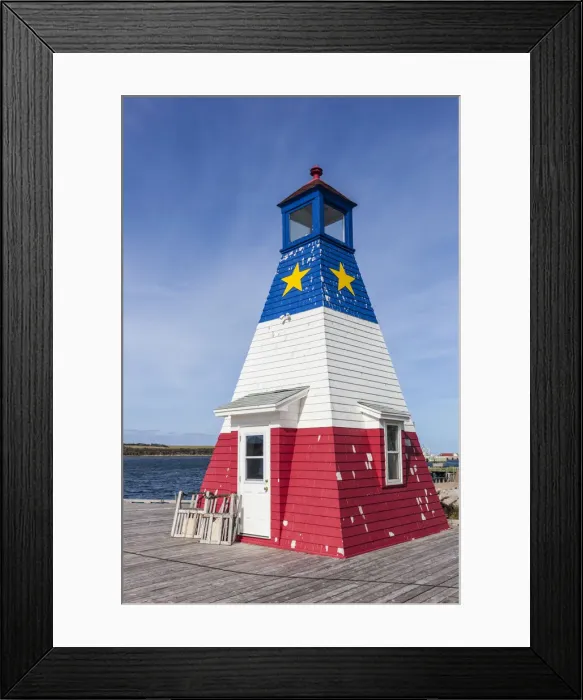 Framed Print : Canada, Nova Scotia, Cabot Trail, Cheticamp, town lighthouse painted in Acadian colors Framed Print : Canada, Nova Scotia, Cabot Trail, Cheticamp, town lighthouse painted in Acadian colors