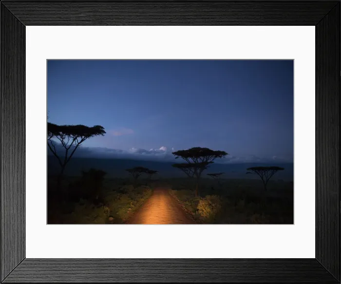 Framed Print : Car headlights illumiate the road into Ngorongoro Crater, before dawn, Tanzania Framed Print : Car headlights illumiate the road into Ngorongoro Crater, before dawn, Tanzania