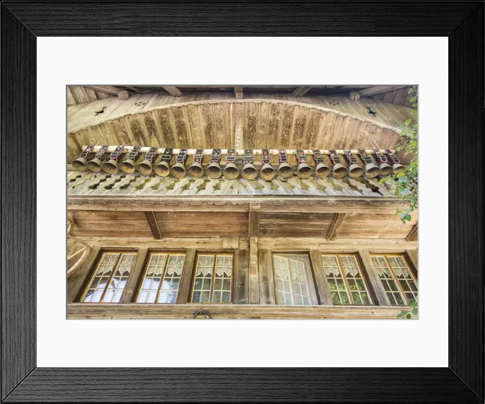 Framed Print : Old chalet with display of cow bells, in the Emmental Valley, Berner Oberland, Switzerland