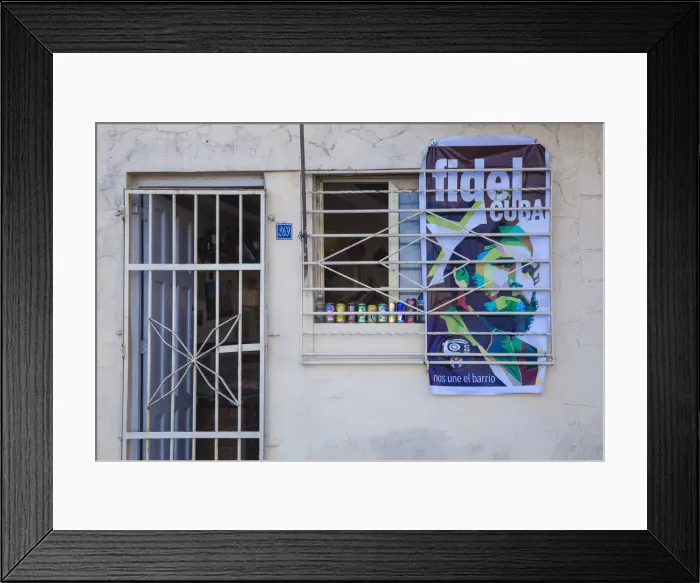 Framed Print : Cuba, Havana, Buildings on The Malecon, Poster of Fidel on shop wall after the death Framed Print : Cuba, Havana, Buildings on The Malecon, Poster of Fidel on shop wall after the death