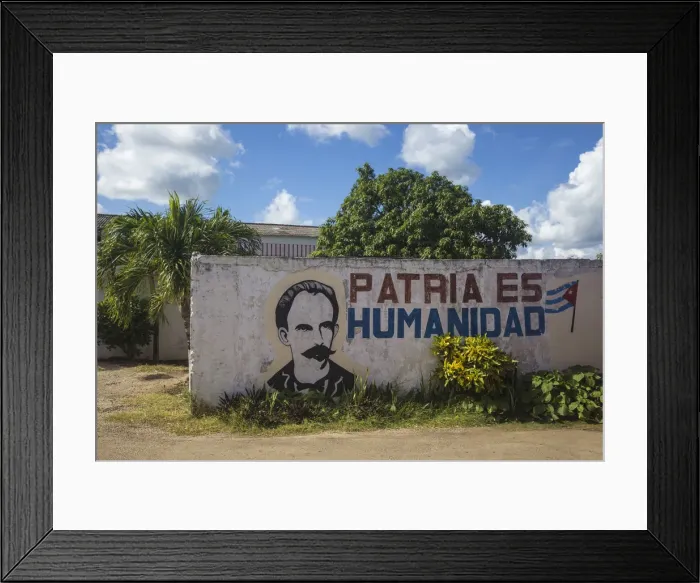 Framed Print : Cuba, Villa Clara province, Remedios, Bus station, Revolutionary slogan painted on wall Framed Print : Cuba, Villa Clara province, Remedios, Bus station, Revolutionary slogan painted on wall