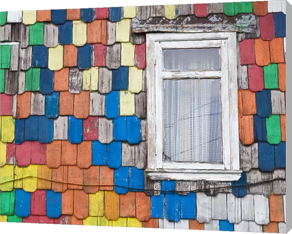 Chile, Chiloe Island, Ancud, colorful house exterior