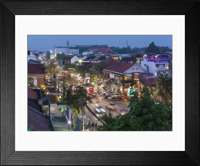 Framed Print : Cambodia, Siem Reap, evening traffic on Sivatha Street, high angle view Framed Print : Cambodia, Siem Reap, evening traffic on Sivatha Street, high angle view
