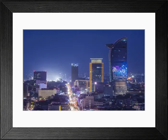Framed Print : Cambodia, Phnom Penh, elevated city skyline along Monivong Boulevard, dusk Framed Print : Cambodia, Phnom Penh, elevated city skyline along Monivong Boulevard, dusk