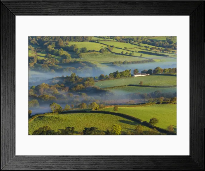 Framed Print : Misty valley in The Western Brecon Beacons National Park, Wales, United Kingdom Framed Print : Misty valley in The Western Brecon Beacons National Park, Wales, United Kingdom