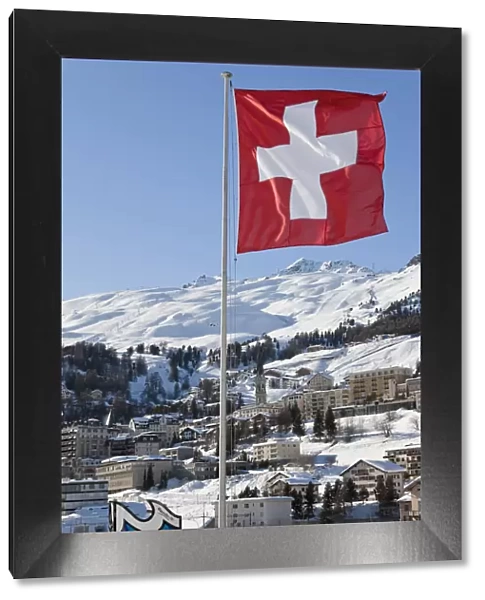 Swiss flag flying, St. Moritz, Upper Engadine, Oberengadin, Graubunden region, Swiss Alps