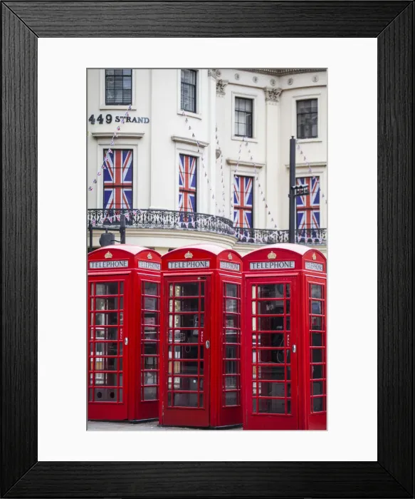 Framed Print : UK, England, London, The Strand, Red telephone box and Union Jack bunting to celebrate Framed Print : UK, England, London, The Strand, Red telephone box and Union Jack bunting to celebrate
