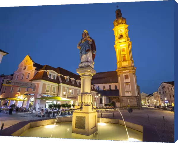 Old Town Water Fountain & Church illuminated at Dusk, Deggendorf, Lower Bavaria