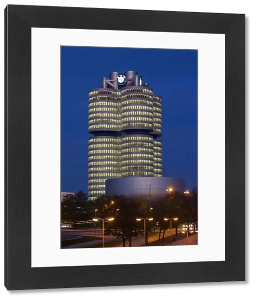 Germany, Bavaria, Munich, BMW company headquarters and BMW Museum, dusk
