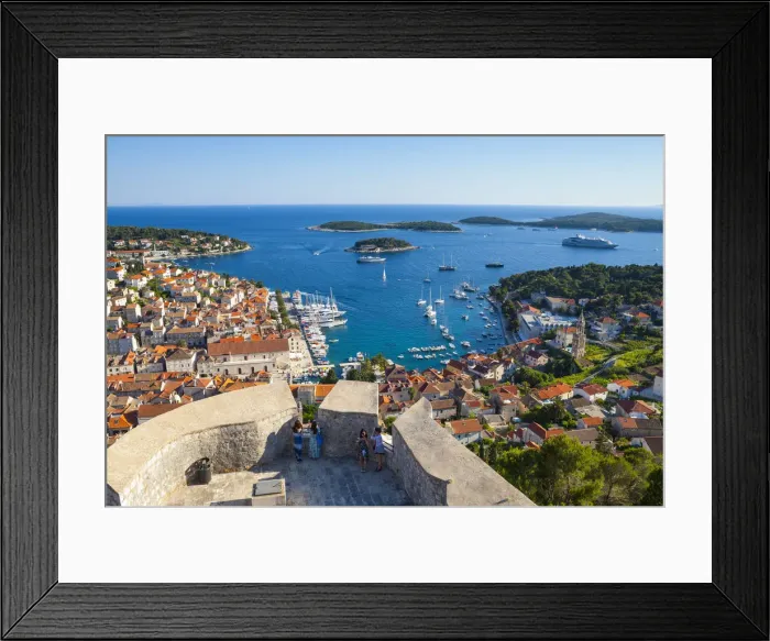 Framed Print : Elevated view over the picturesque harbour town of Hvar from the Citadel, Hvar Town Framed Print : Elevated view over the picturesque harbour town of Hvar from the Citadel, Hvar Town