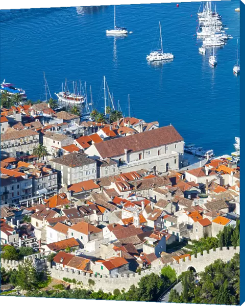 Elevated view over the picturesque harbour town of Hvar, Hvar, Dalmatia, Croatia