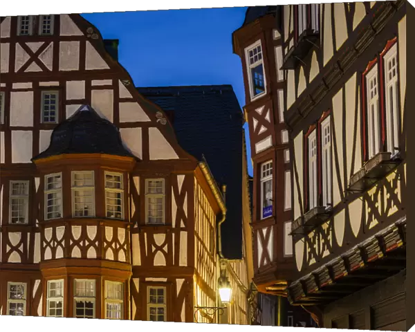 Germany, Hesse, Limburg an der Lahn, traditional half-timbered building, dawn