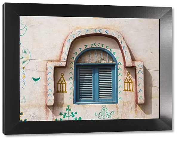 Egypt, Upper Egypt, Aswan, Blue window shutters on house in Nubian village on Elephantine