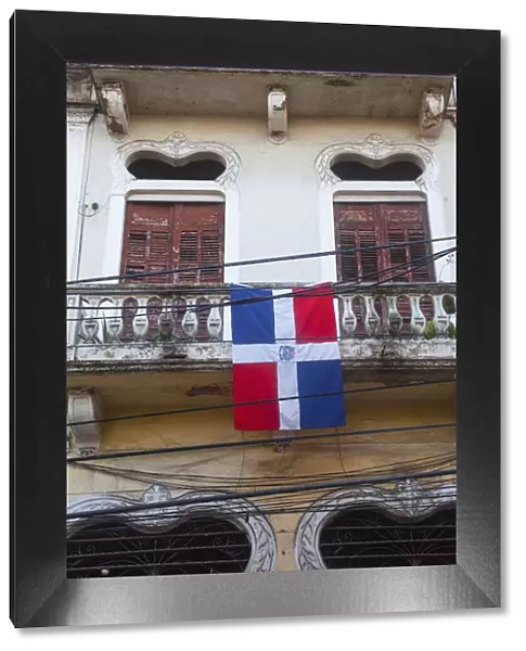 Dominican Republic, Santa Domingo, Colonial zone, Flag on balcony of house on Calle