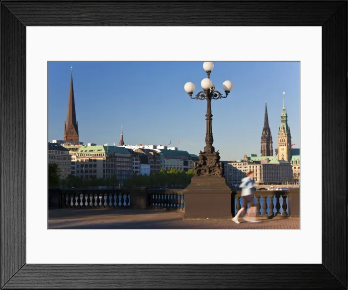 Framed Print : Jogger & City Skyline by Binnenalster Lake, Hamburg, Germany Framed Print : Jogger & City Skyline by Binnenalster Lake, Hamburg, Germany
