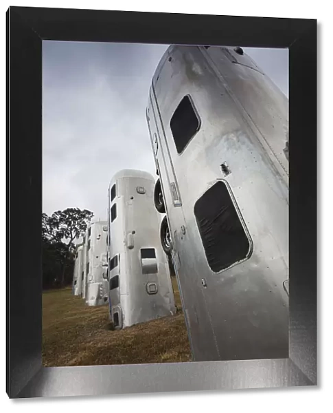 USA, Florida, Dover, Airstream Ranch, burried aluminum car trailers