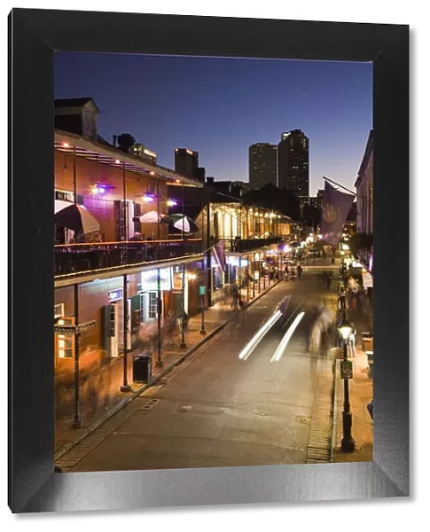 USA, Louisiana, New Orleans, French Quarter, Bourbon Street and city skyline, elevated